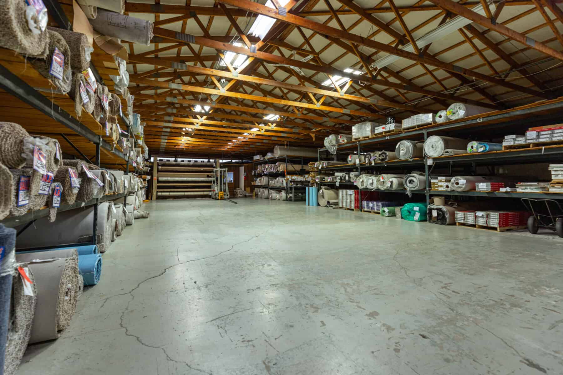 Warehouse of carpet rolls